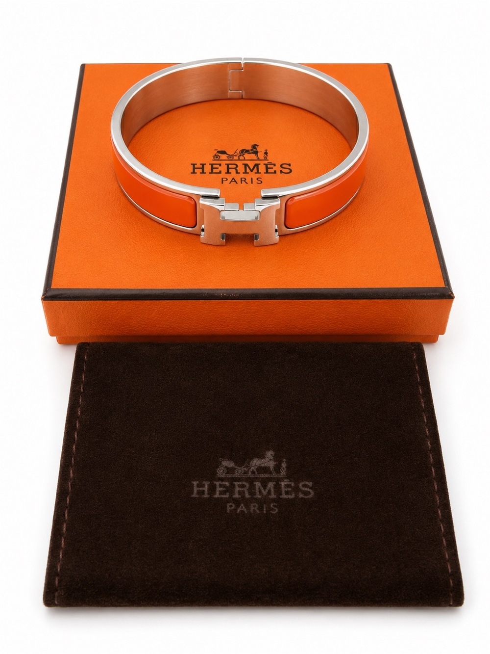 ❌❌SOLD❌❌
Hermes Orange Enamel Clic H Bracelet with Palladium Hardware